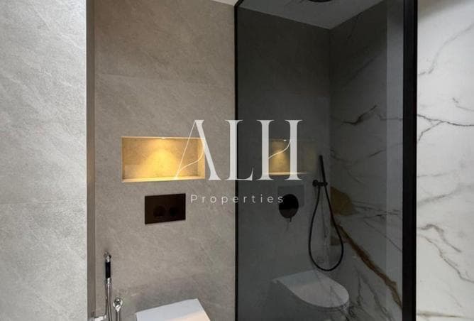 Walk-in marble rain shower