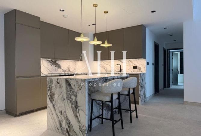Marble waterfall kitchen island