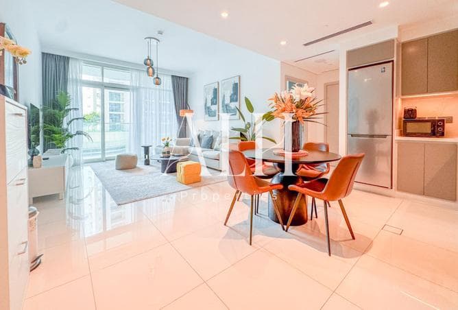Dining table open to the kitchen