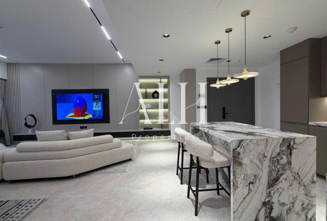 Rimal 1 two bedroom — living space with marble kitchen island