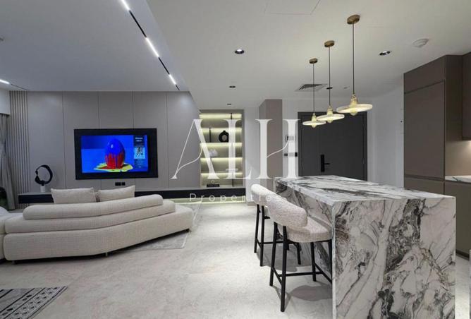 Rimal 1 two bedroom — living space with marble kitchen island